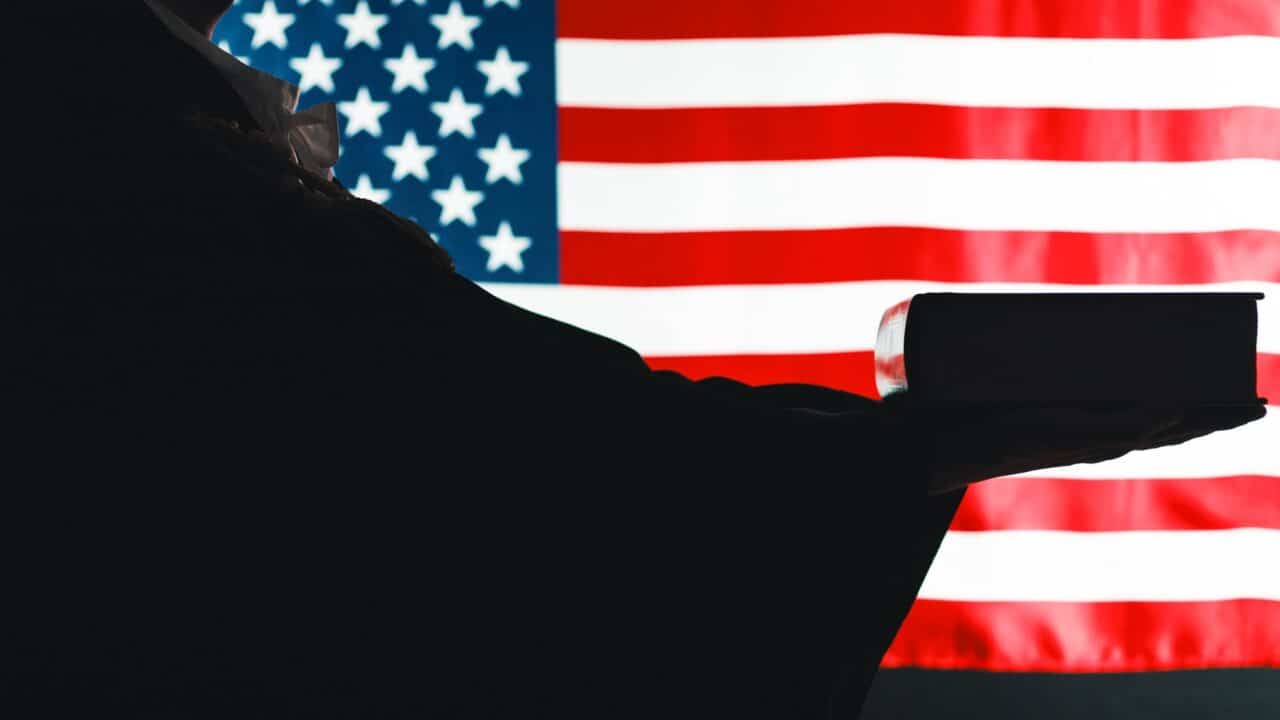 United states Supreme Court Justice Takes the Oath with Book.